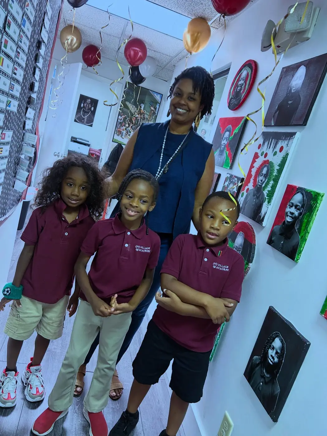 Village Academy educator with students