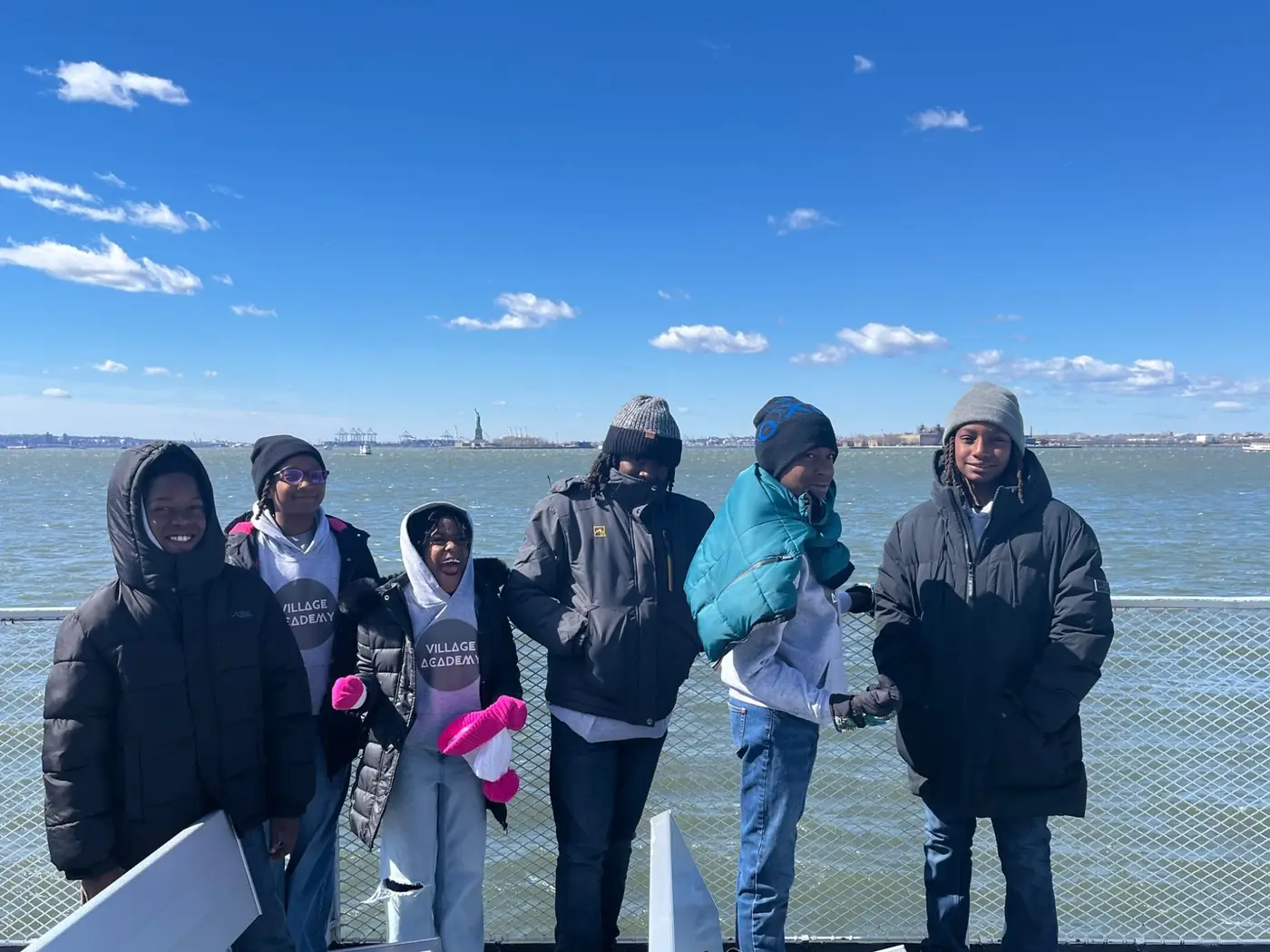 Village Academy students traveling through New York Harbor