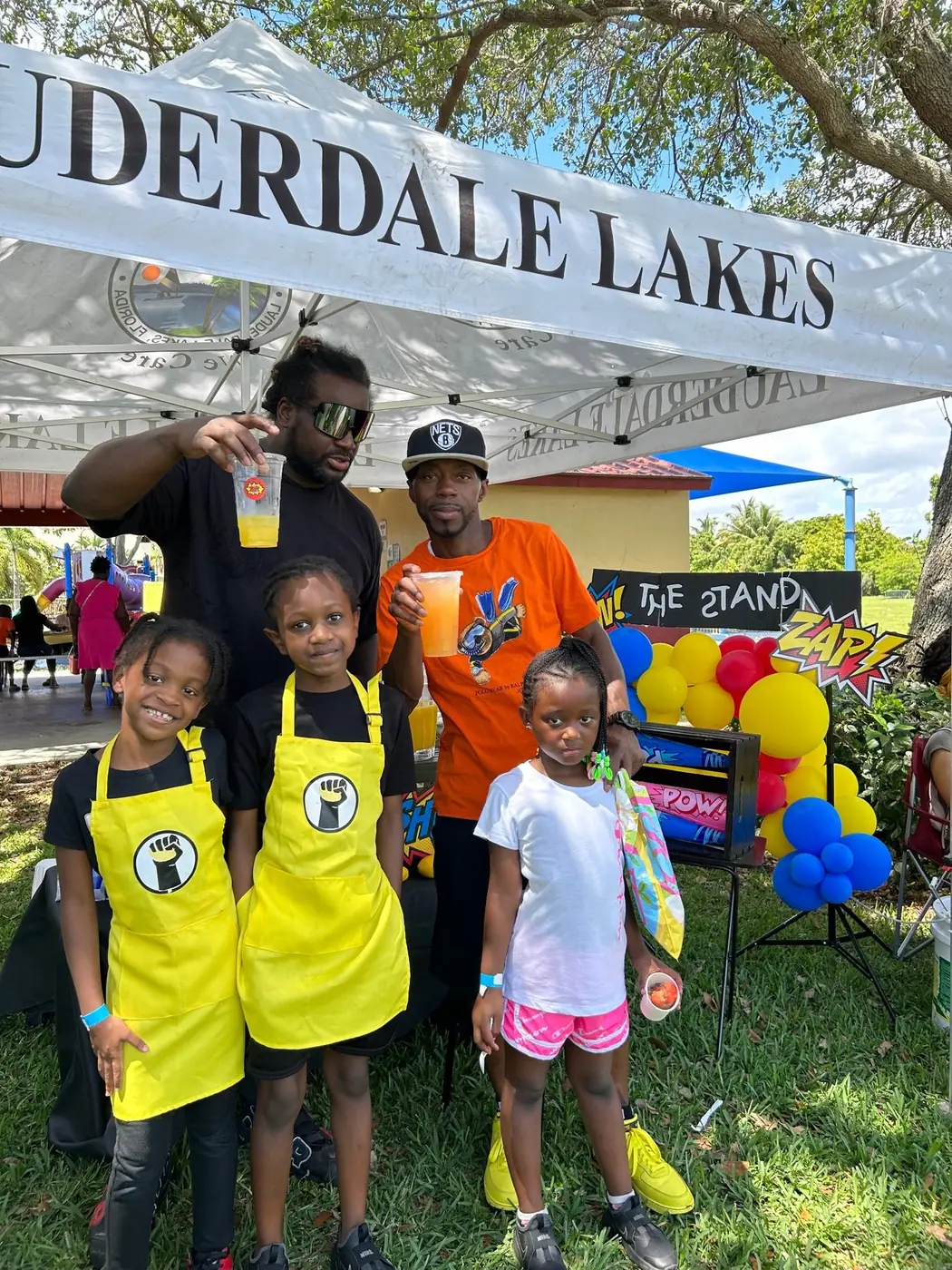 The Stand students and community members at an outdoor event